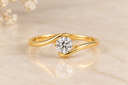 14K Yellow Gold Round Brilliant Bypass Solitaire Ring.